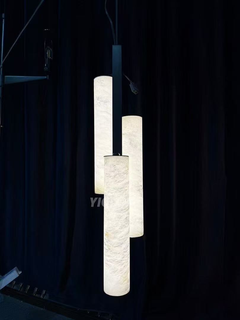 Three-cylinder pendant illuminated during production testing
