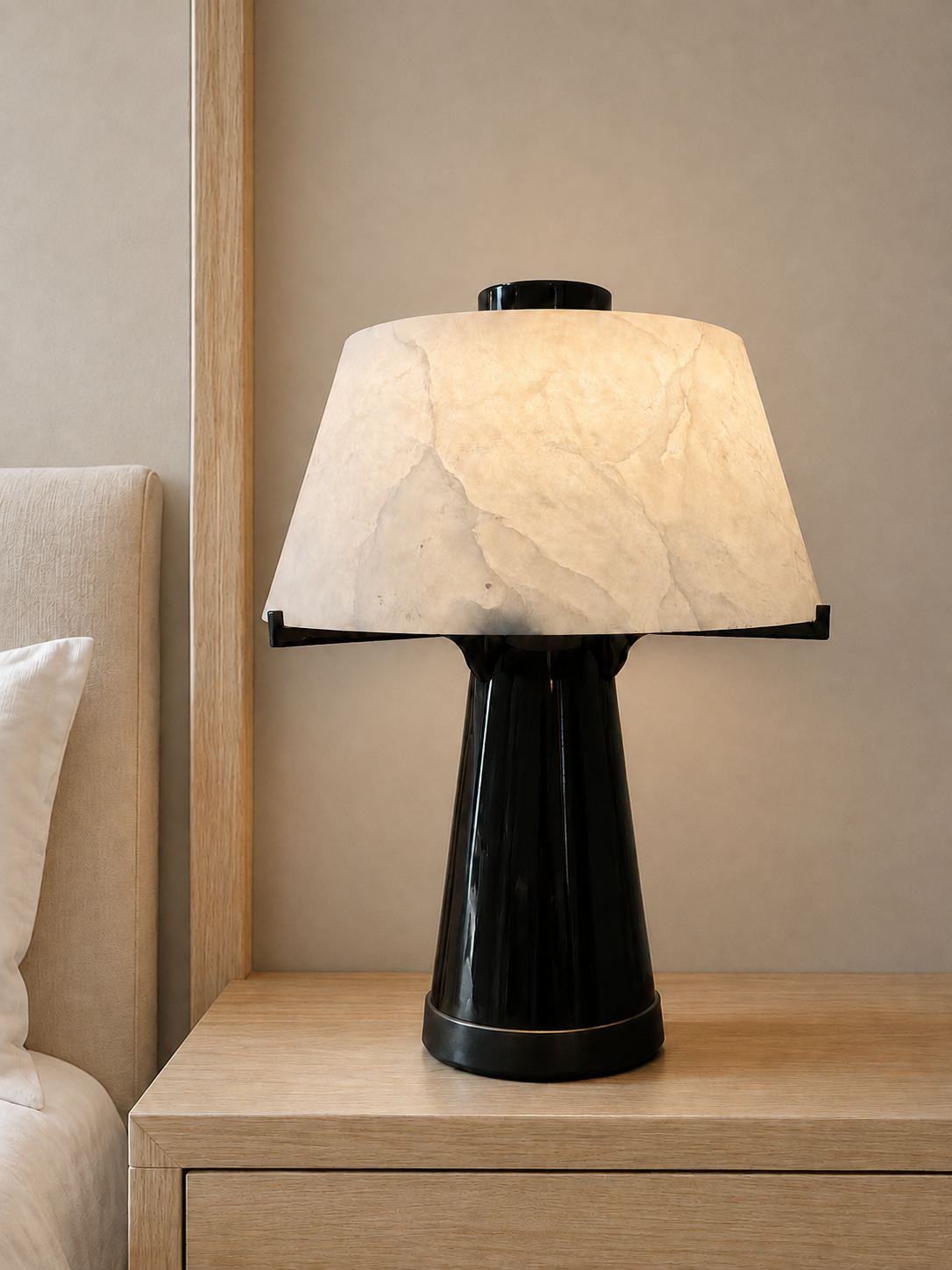 Interior visualisation featuring a sculpted table light with an illuminated shade and tapered dark base